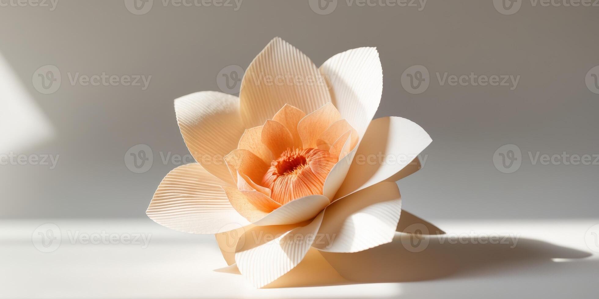 Delicate Cream Paper Flower with Orange CenterDelicate Cream Paper Flower with Orange Center. photo