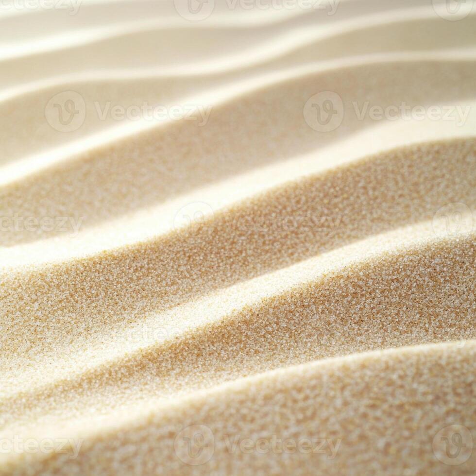 Waves of fine sand create interesting patterns under soft natural light in a serene environment photo