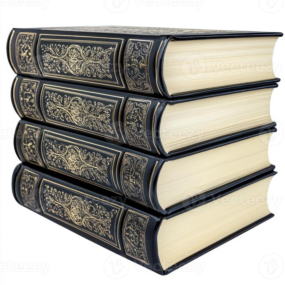 Stack of ornate leather-bound books resting on a surface with intricate designs photo