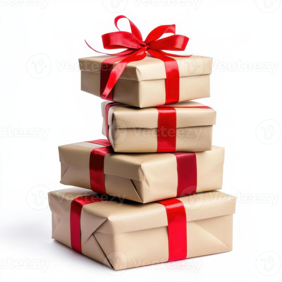 Gift boxes stacked elegantly with red ribbons for a festive occasion in a bright setting photo