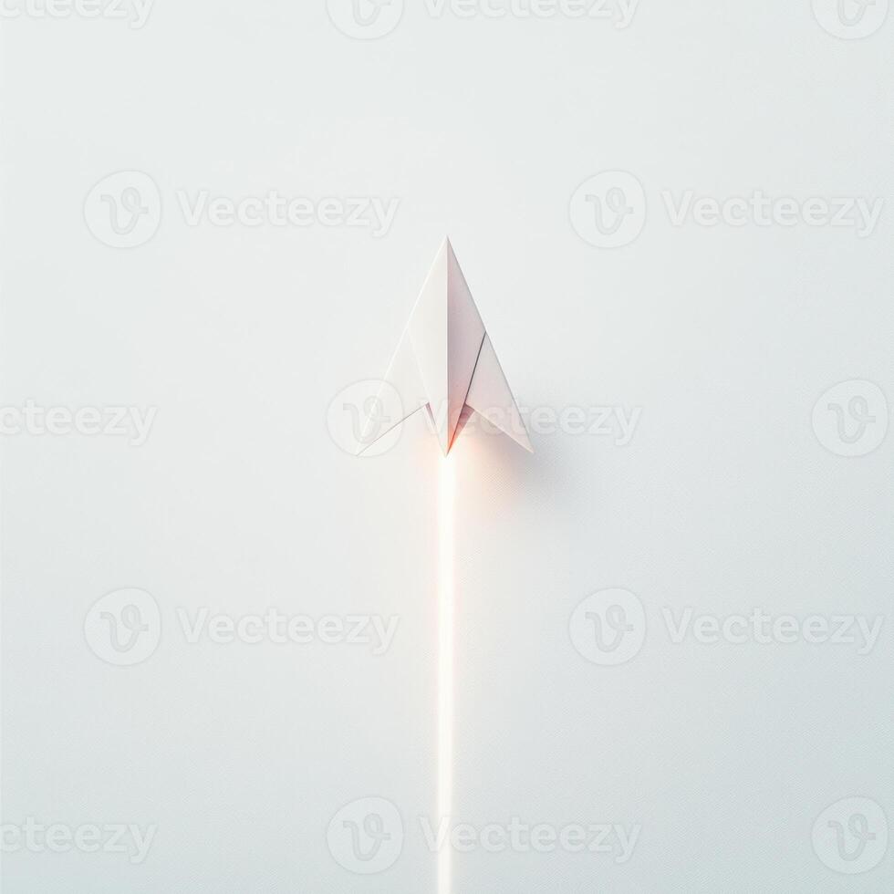 Paper airplane takes flight against a minimalistic background enhancing the sense of motion photo