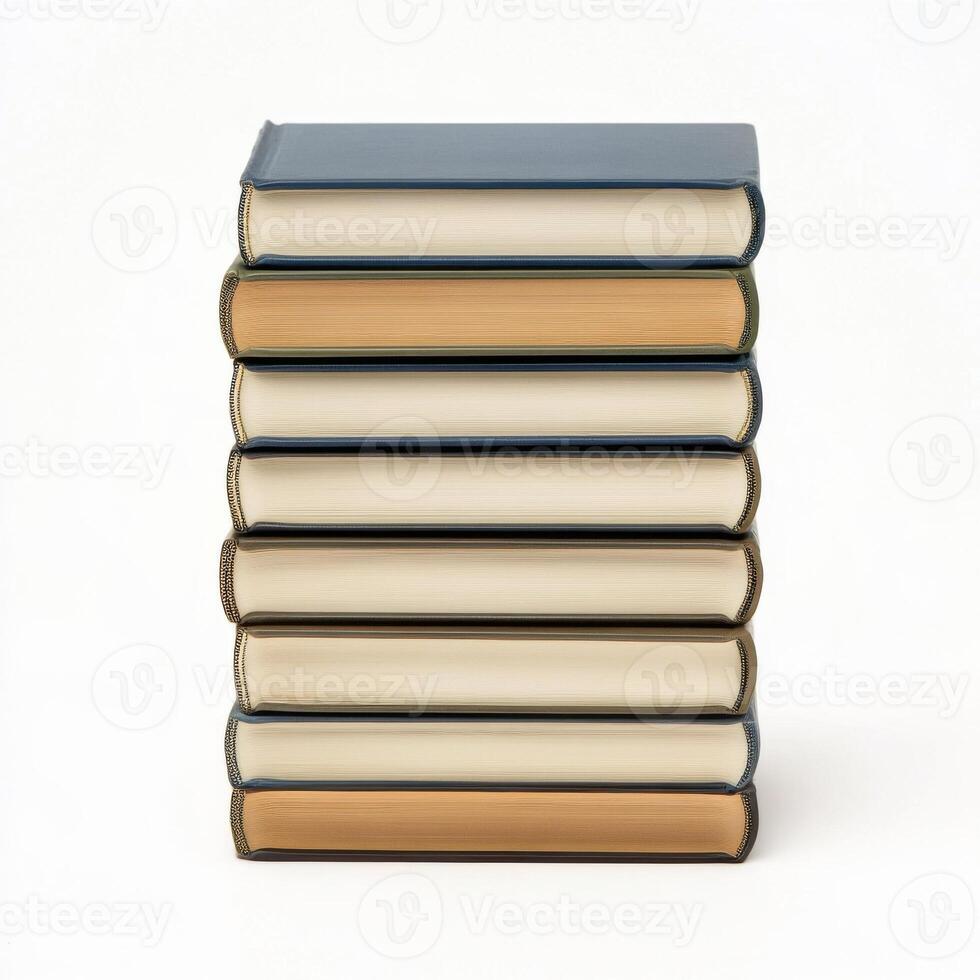 Stack of vintage books arranged neatly on a white surface with a simple design photo