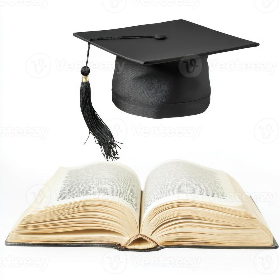 Graduation cap above an open book symbolizing academic achievement and learning journey photo