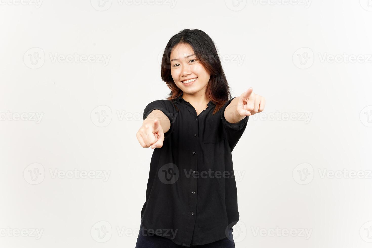 Smiling and pointing at camera of Beautiful Asian Woman Isolated On White Background photo