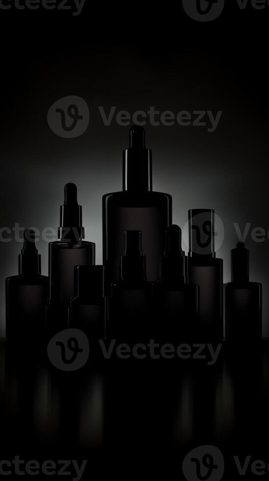 A row of black bottles with a black background photo