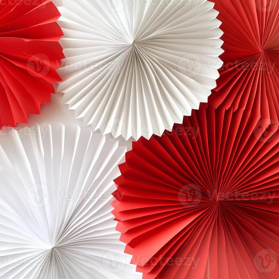 Vibrant Red and White Paper Fans Creating a Dynamic Geometric Pattern photo
