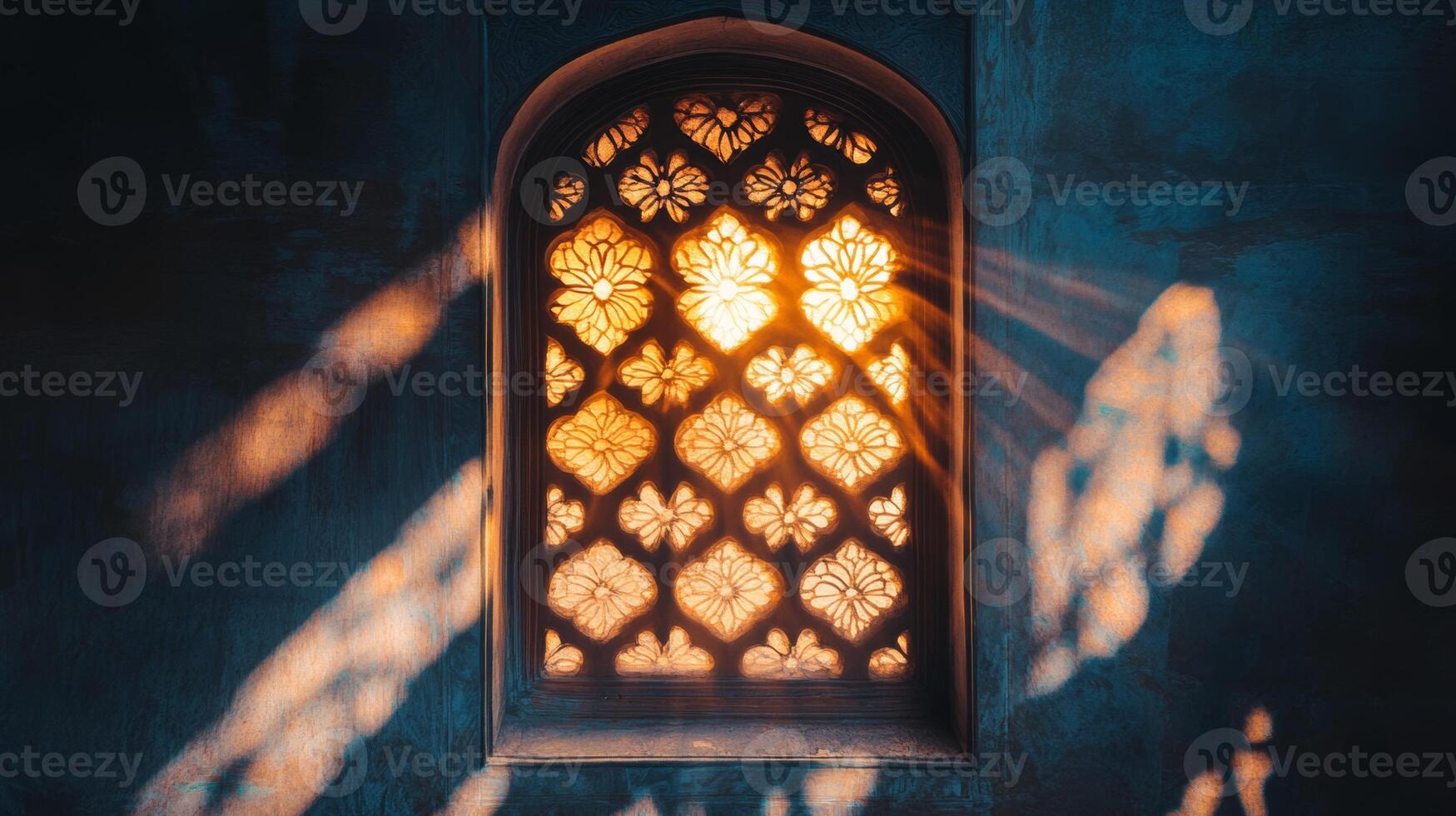 A window with a sun shining through it photo