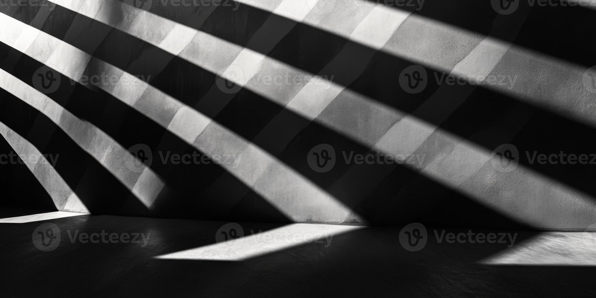 Abstract Shadows and Light Patterns on a Wall Creating a Modern Geometric Design in Black and White photo