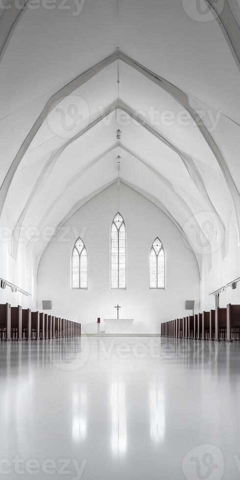 A large, empty church with white walls and a high ceiling photo
