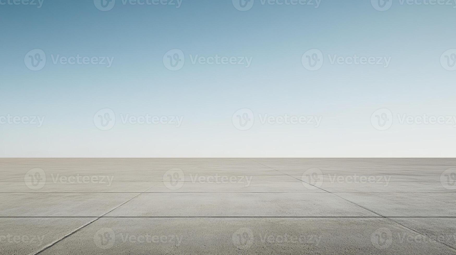 Minimalist Urban Landscape with Clear Blue Sky and Expansive Concrete Surface in Daylight photo