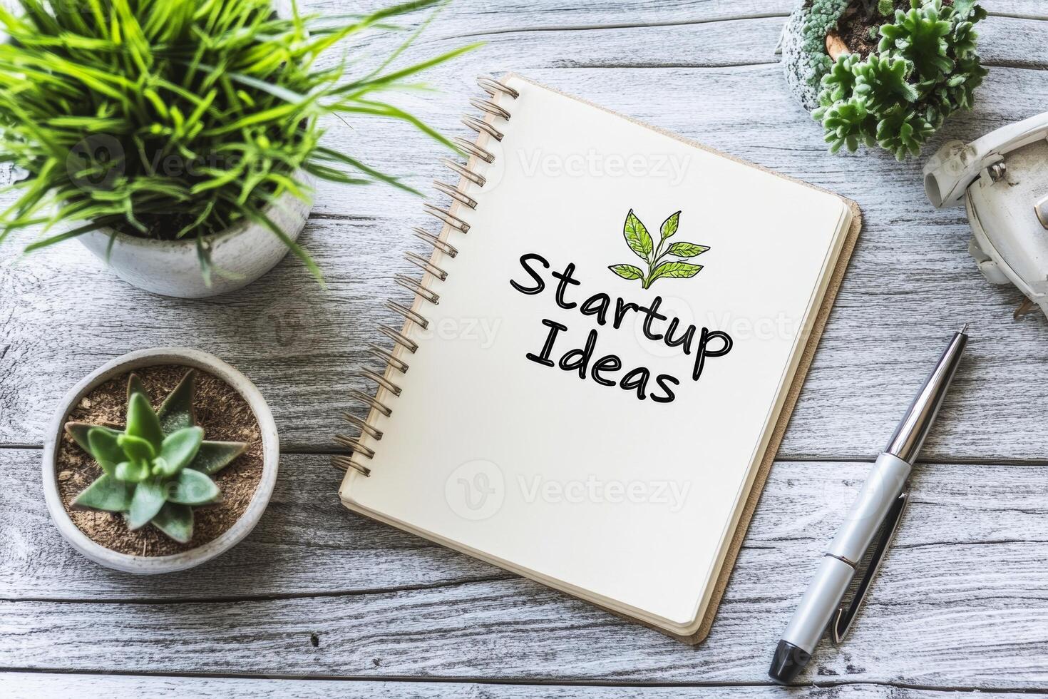 Simple Notebook with Startup Ideas in Green Leaf Design photo
