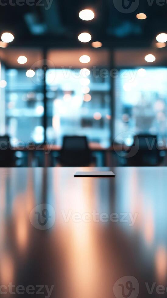 A table with a laptop on it and a chair in the background photo