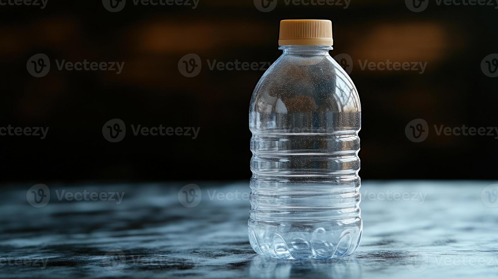 A single water bottle stands proudly on a polished surface, reflecting ambient light photo