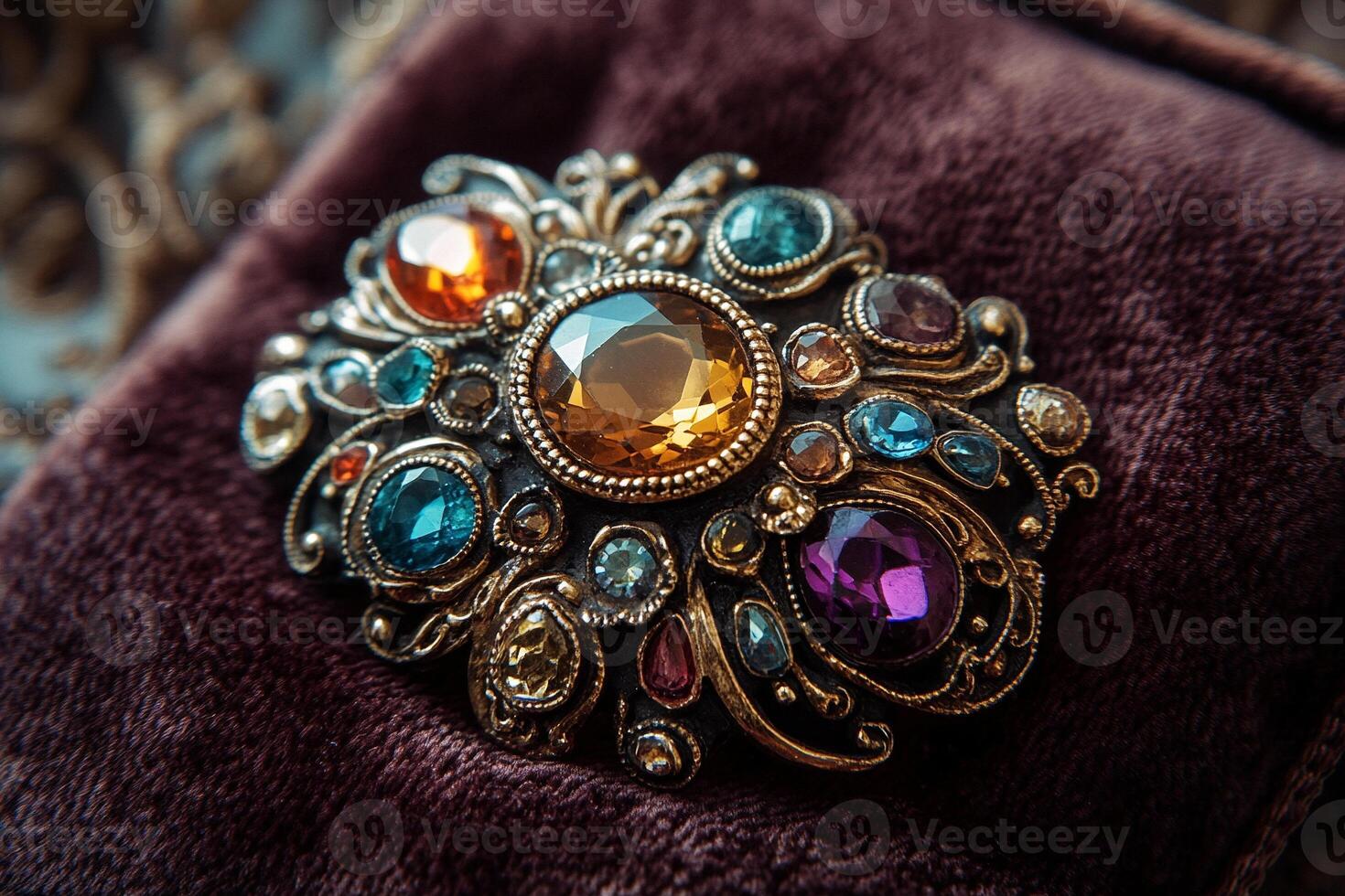 Macro photography of a vintage brooch with colorful gemstones in ornate gold filigree setting on velvet fabric background photo