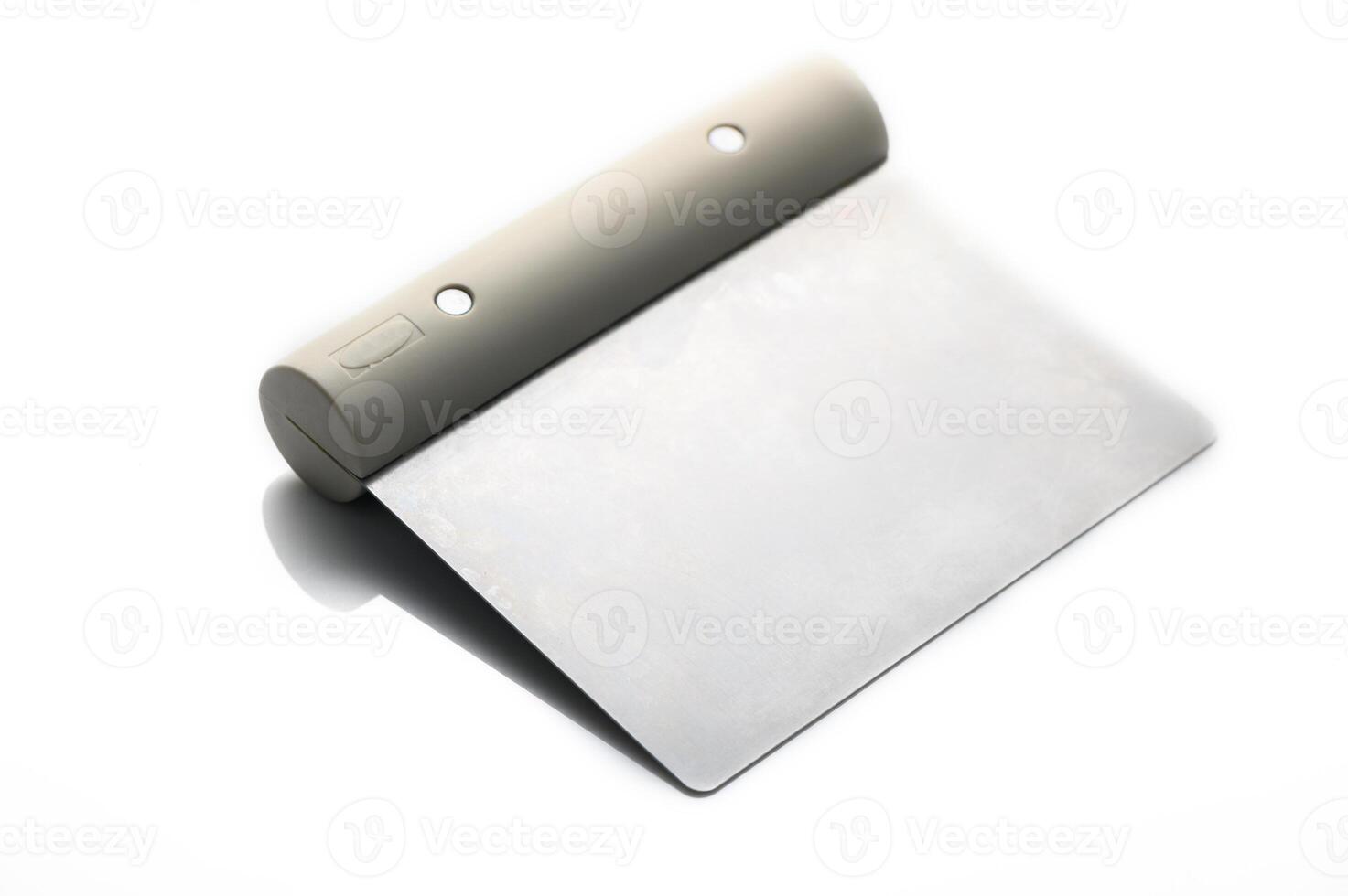 Innovative design of a sleek, minimal notebook resting on a smooth surface with natural lighting photo