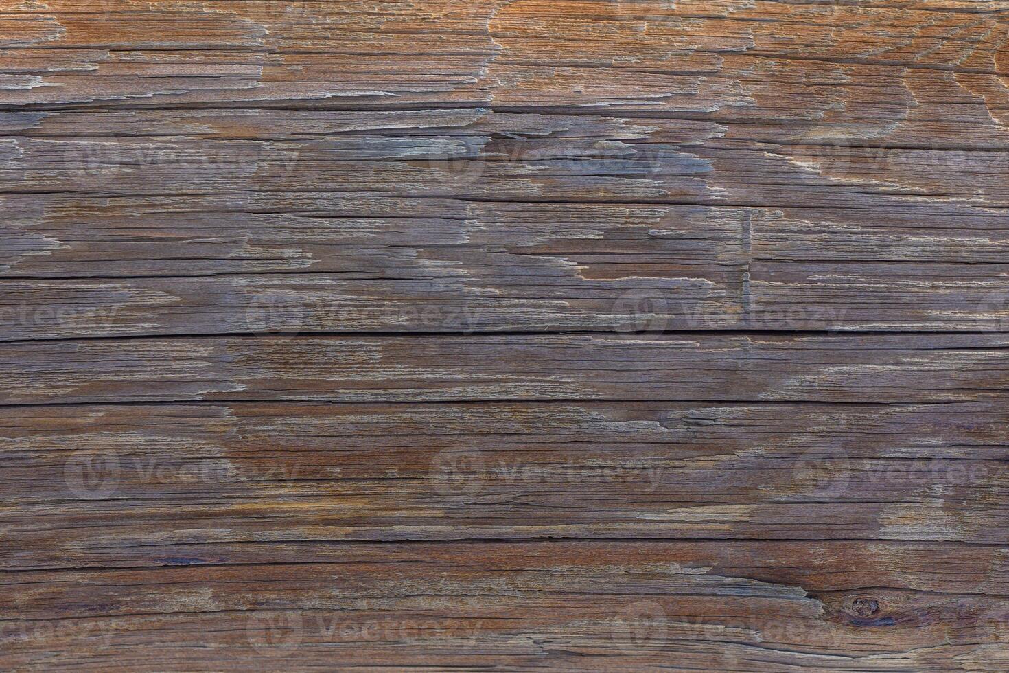 Rustic wooden surface showcasing natural textures and warm hues from a sunlit workshop environment photo