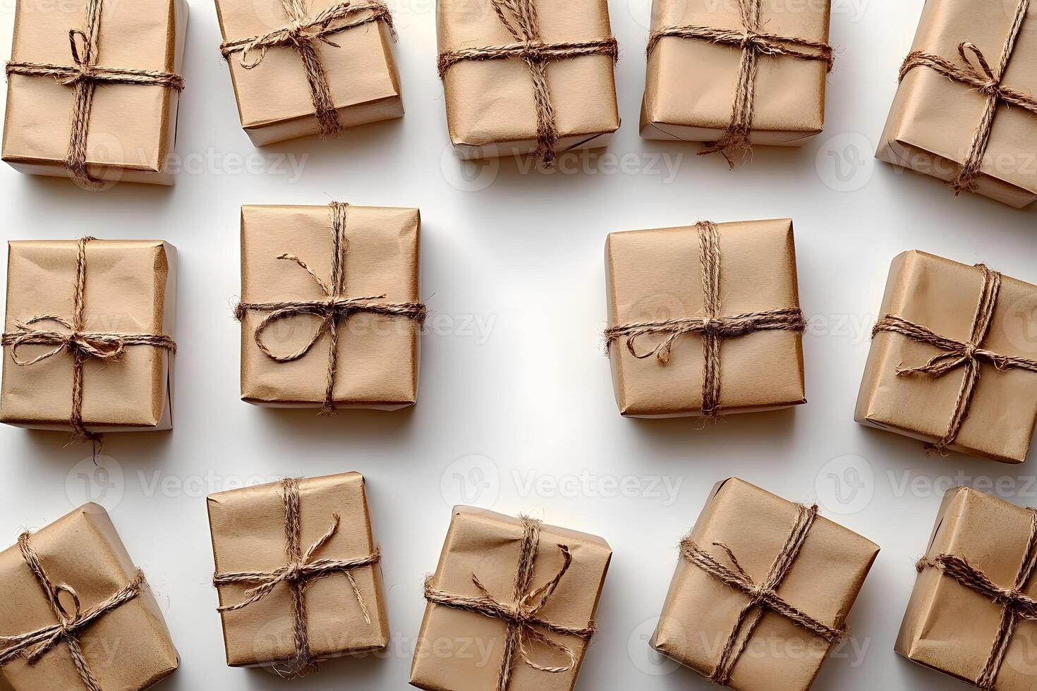 Rustic Gift Boxes Patterned Layout with Brown Paper and Twine Ties for Holiday and Event Celebrations photo