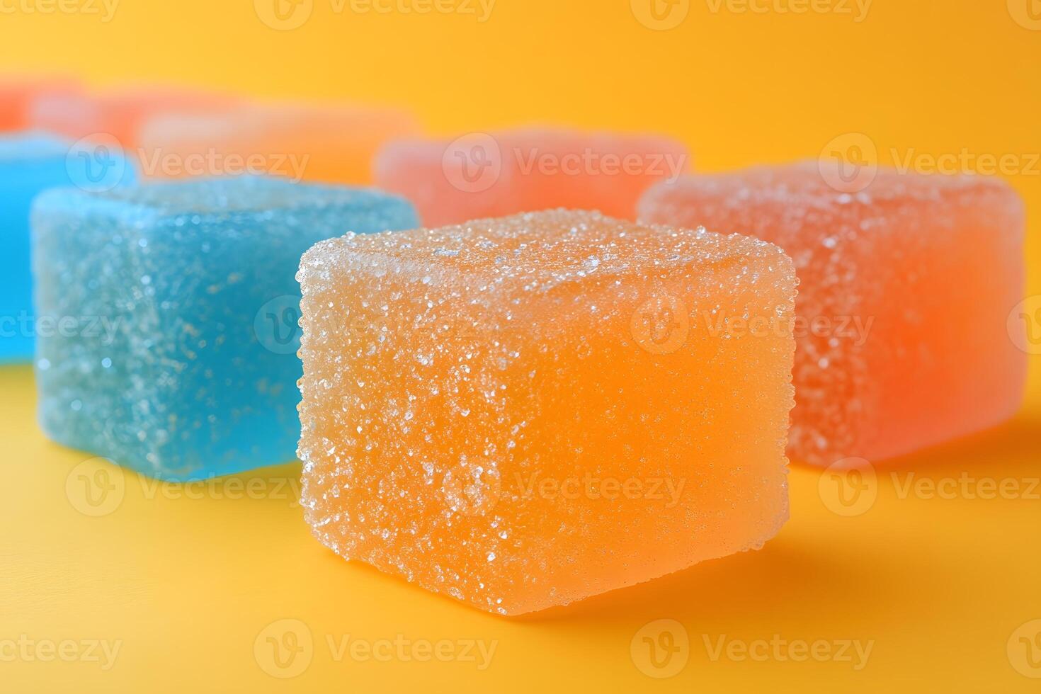 Vibrant Candy Cubes with Sugar Coating on Bright Yellow Background for Sweetness Concept photo