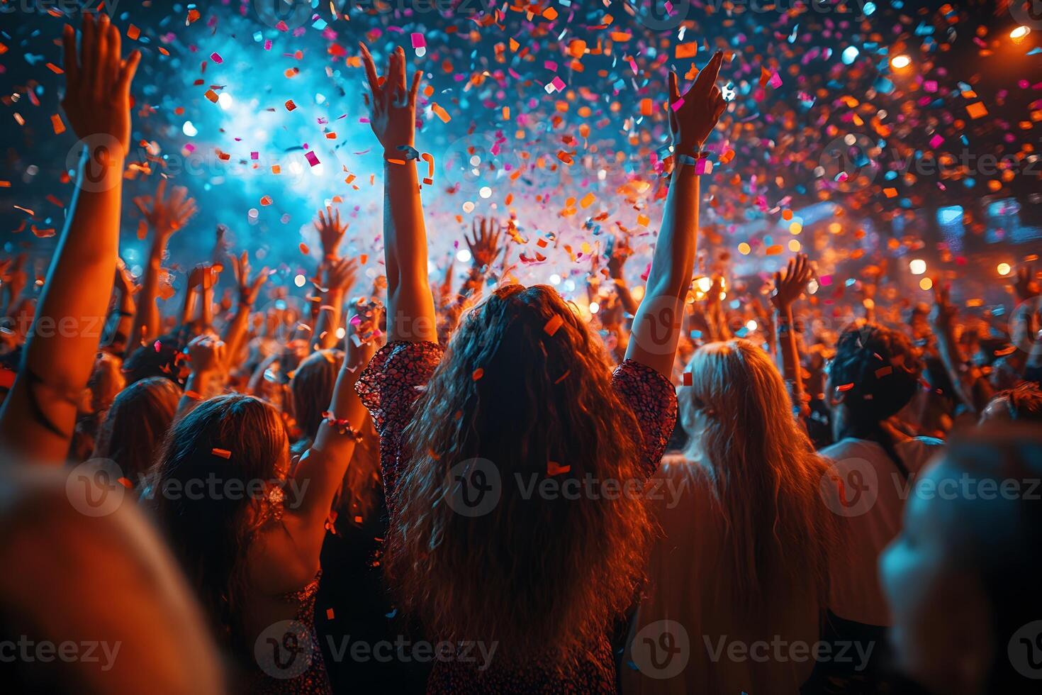 Vibrant Celebration Enthusiastic Crowd Enjoys Live Music Event with Confetti Explosion photo