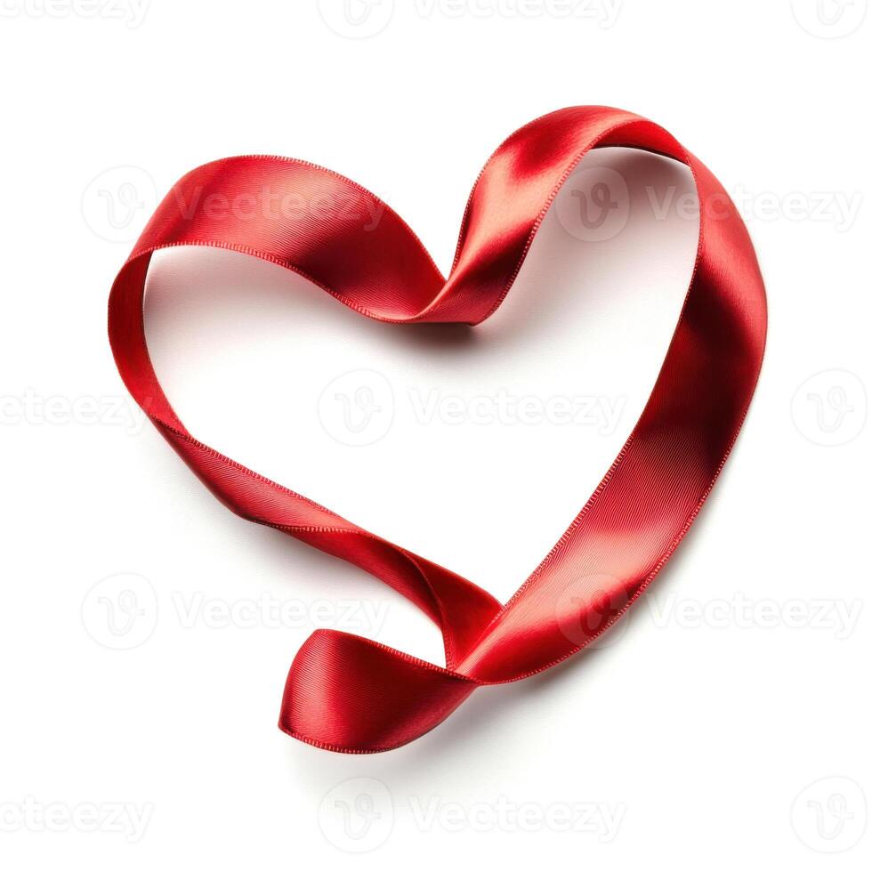 Red ribbon forms a heart shape on a plain background to symbolize love and affection in various contexts photo