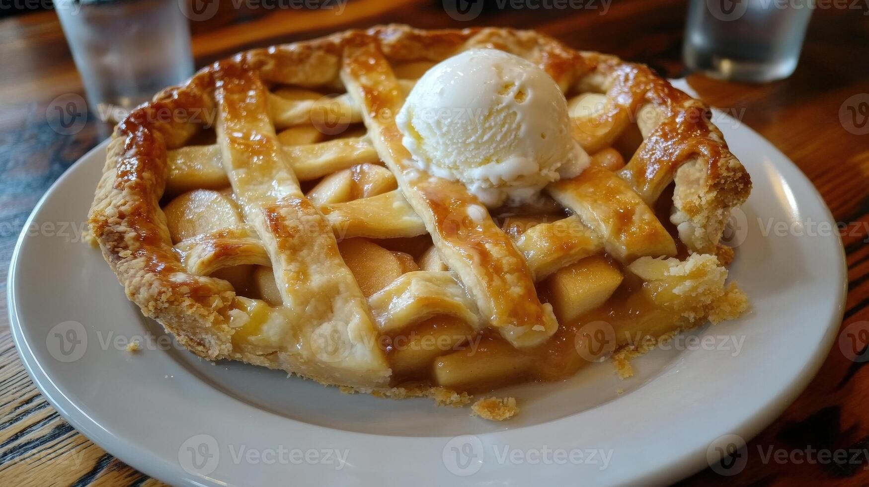 Delicious Apple Pie Served With A Scoop Of Ice Cream photo