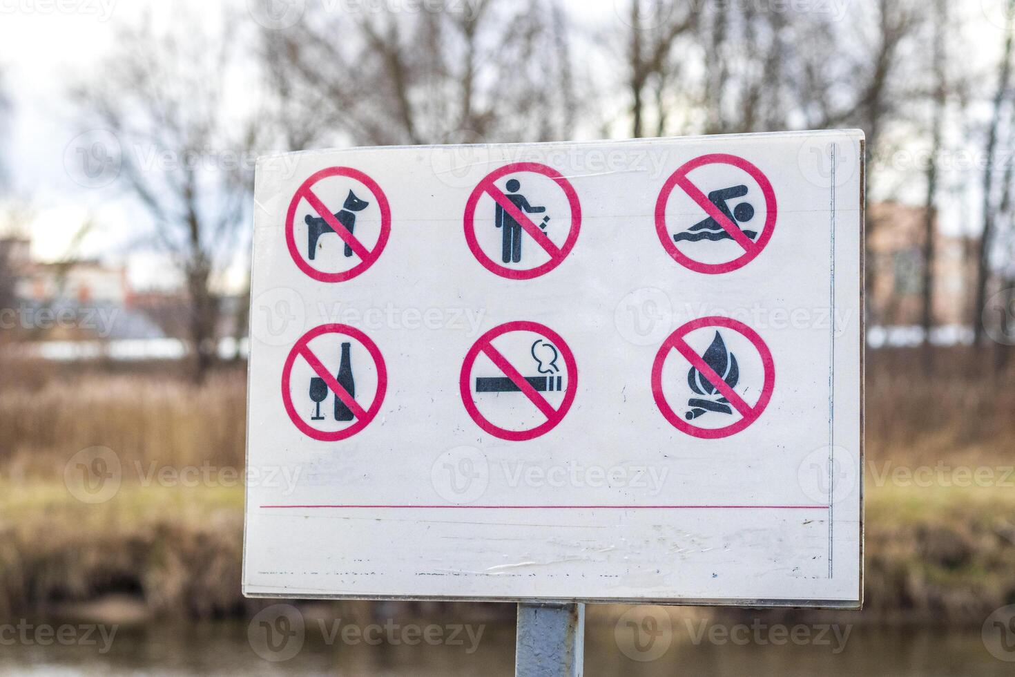 Close up shot of the information board in the park with restriction icons, Concept photo