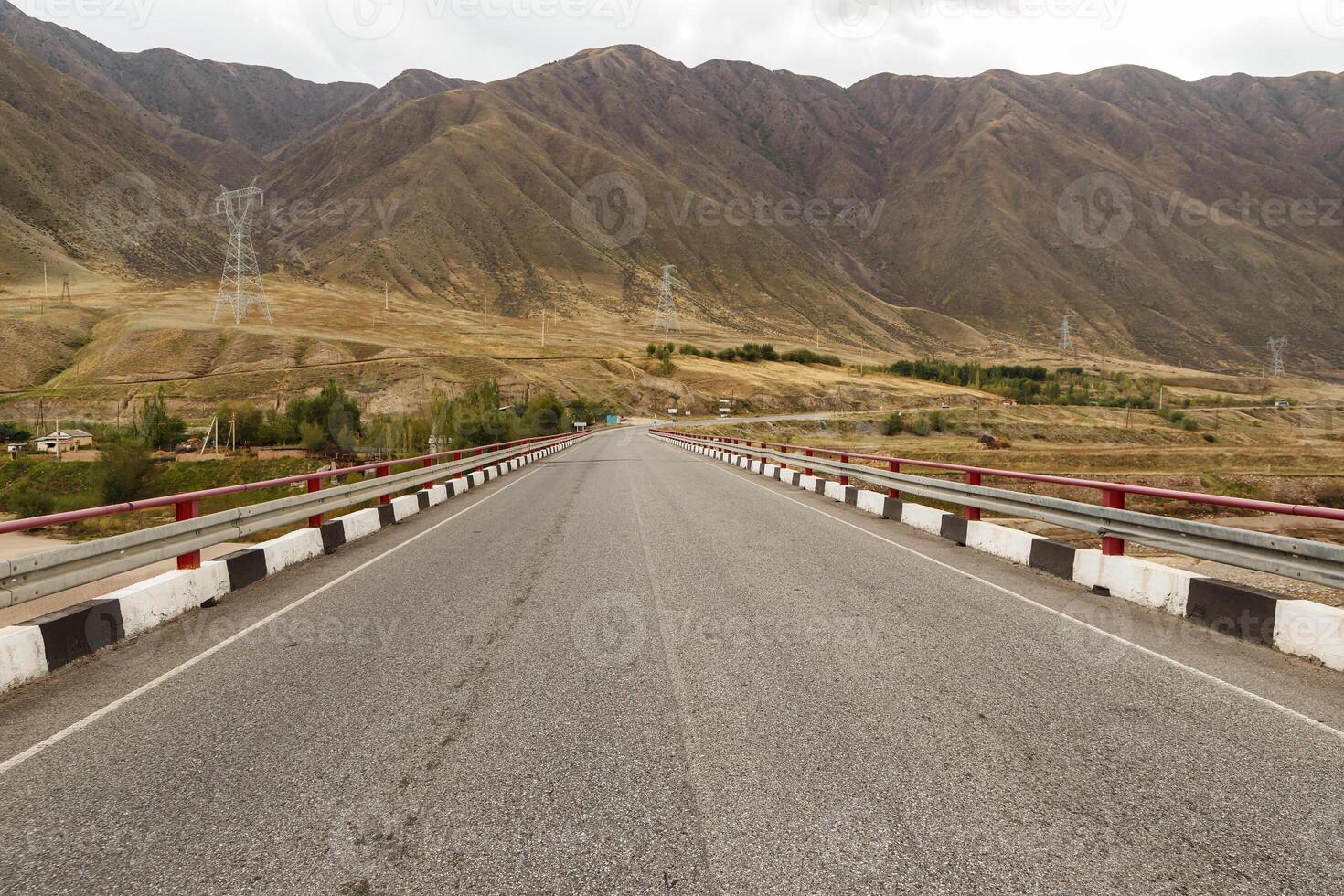bridge over the Naryn river near the Toktogul reservoir on the Bishkek Osh highway in Kyrgyzstan. photo