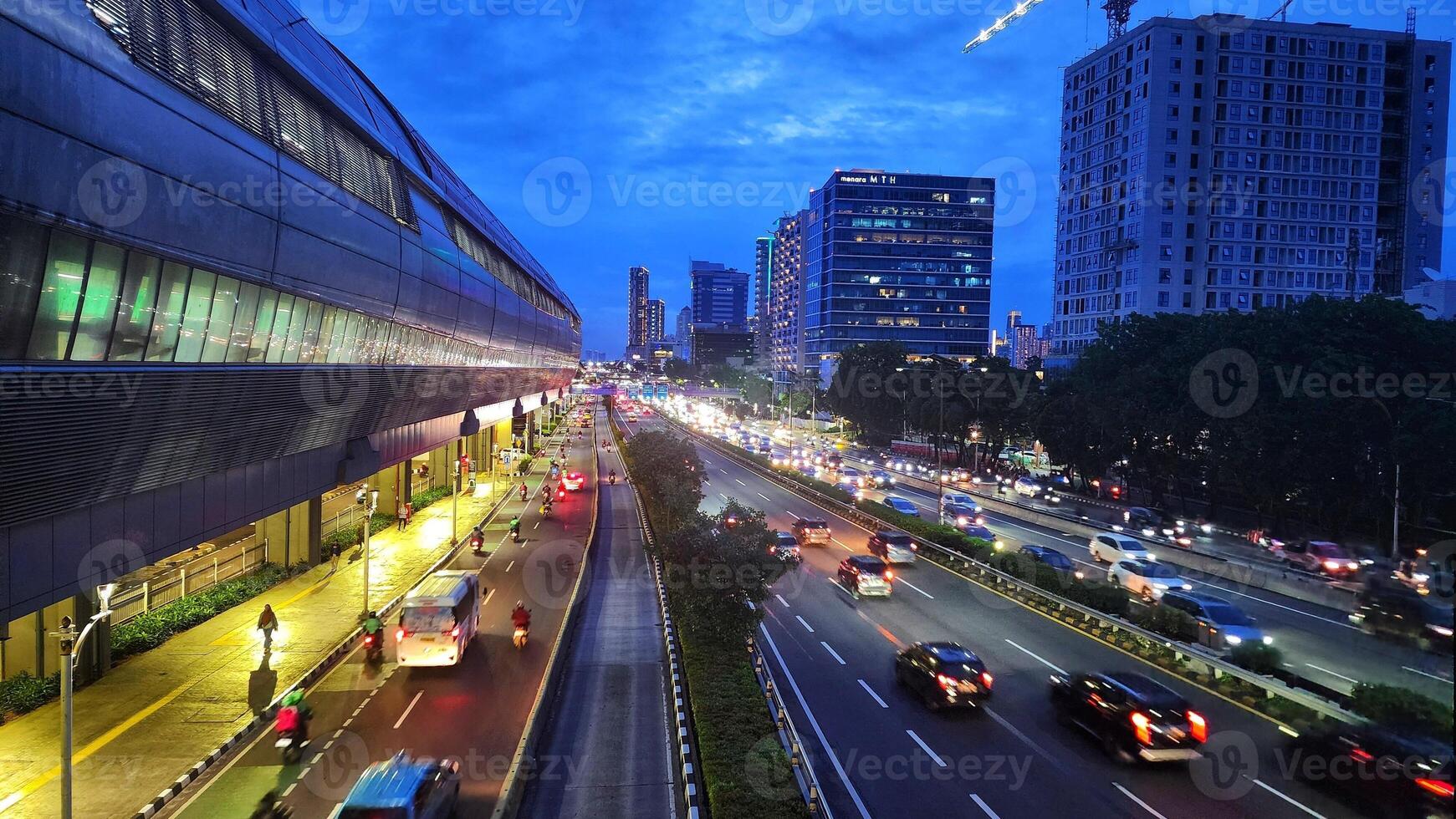 the light trails on the modern building in Jakarta, Indonesia. photo