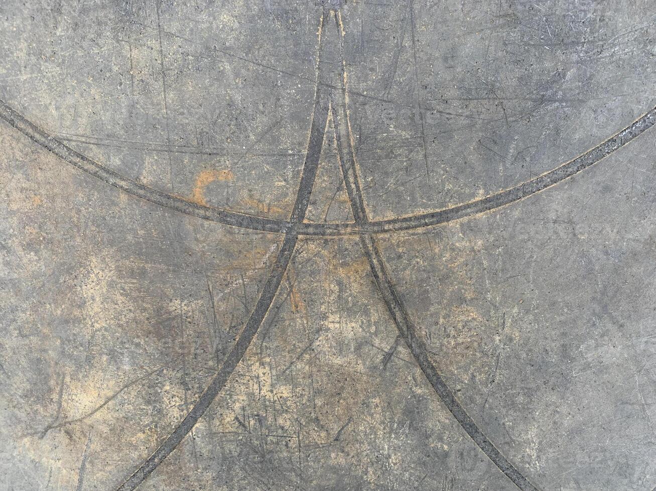 Old plastic texture background, Abstract scratched texture with curved intersecting lines on a distressed plastic surface photo