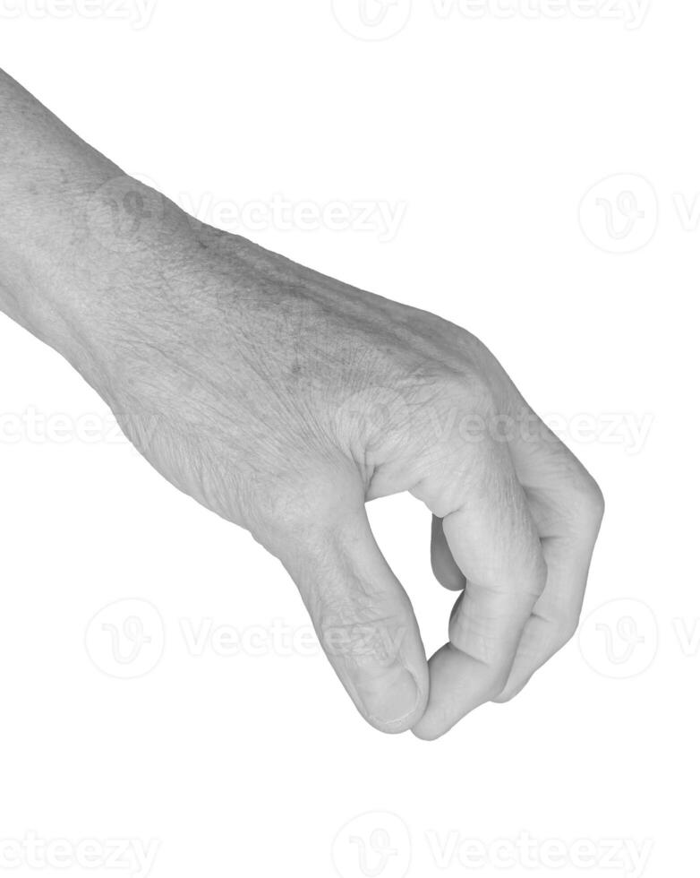 Pinch gesture. Senior woman s wrinkled hand with thumb and index finger pinched together, holding or photo