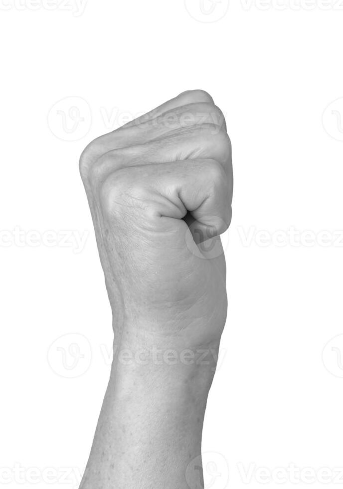 Clenched fist gesture. Senior woman s wrinkled hand in a tight, closed position, symbolizing photo