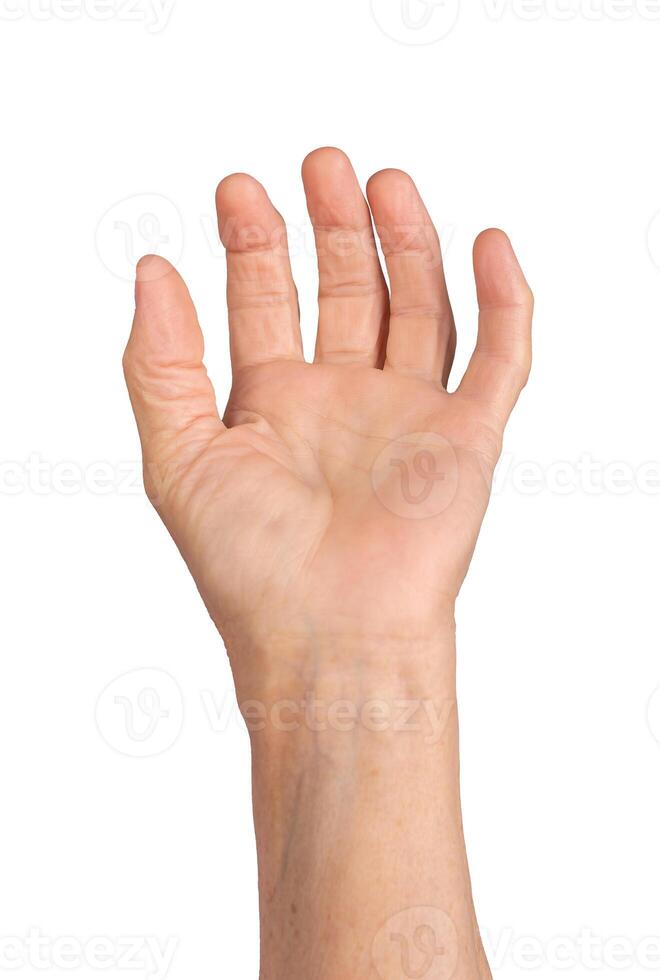 Grasping hand gesture. Senior woman s wrinkled hand with fingers spread and slightly curved, palm photo