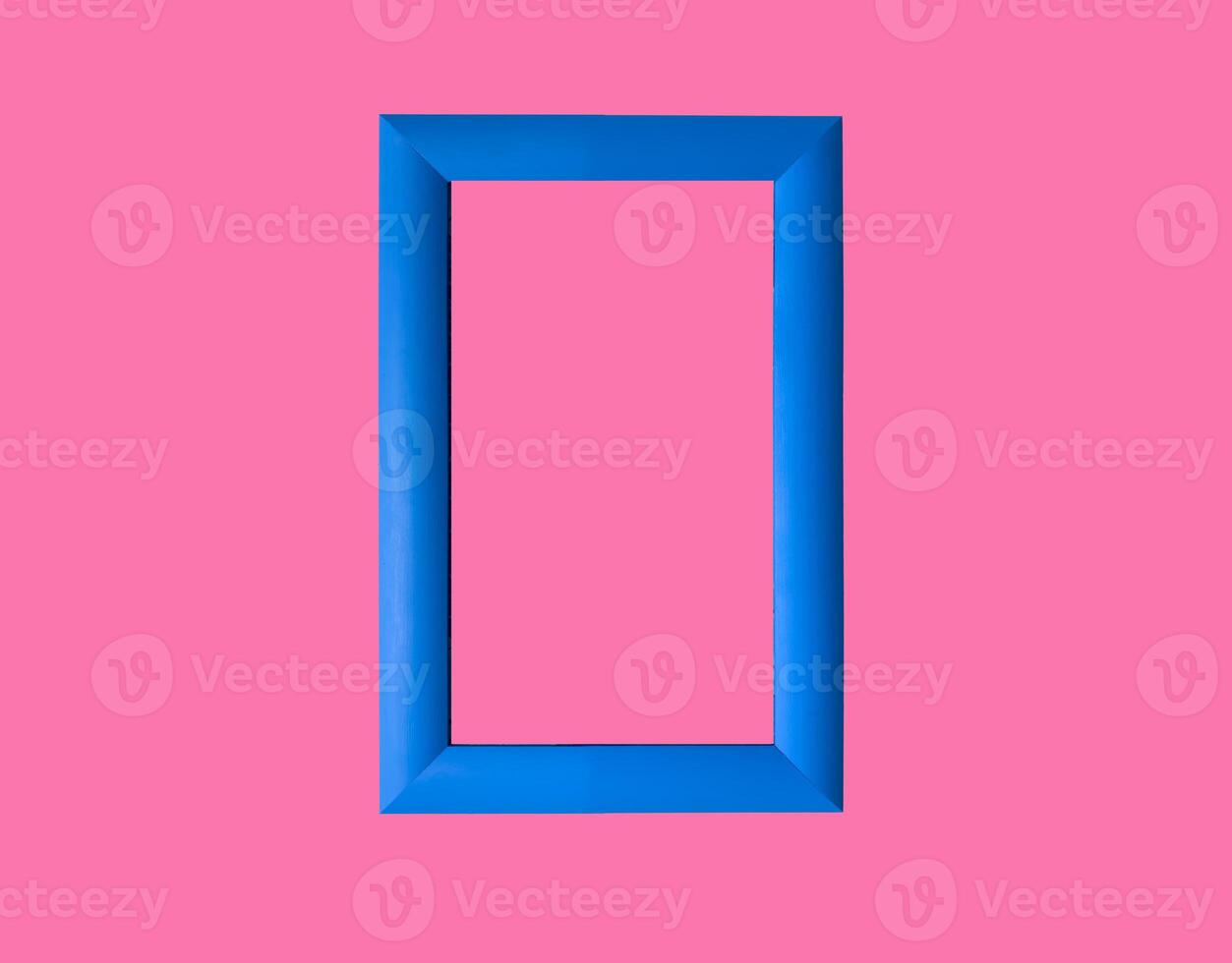 Modern rectangular picture frame, wall art in pop style. Blue border on pink background. Stylish and photo