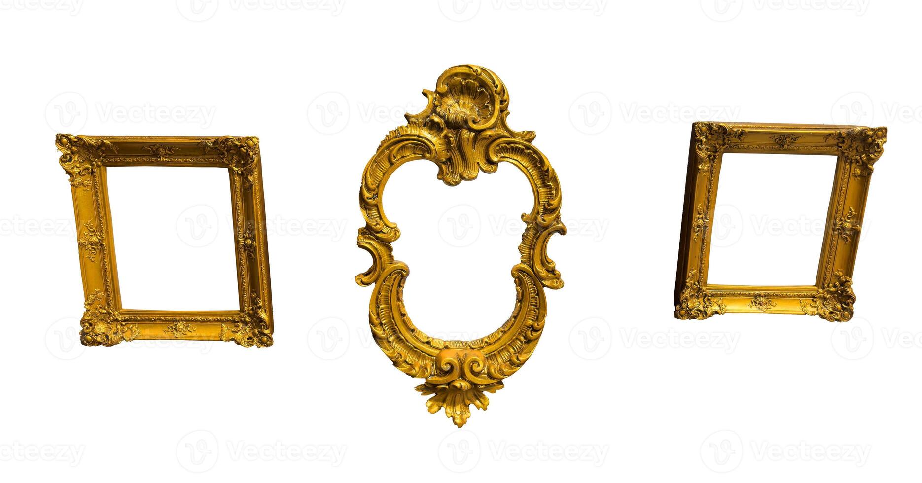 Vintage frames hanging on wall, set. Ornate golden baroque-style frames in various shapes, arranged photo