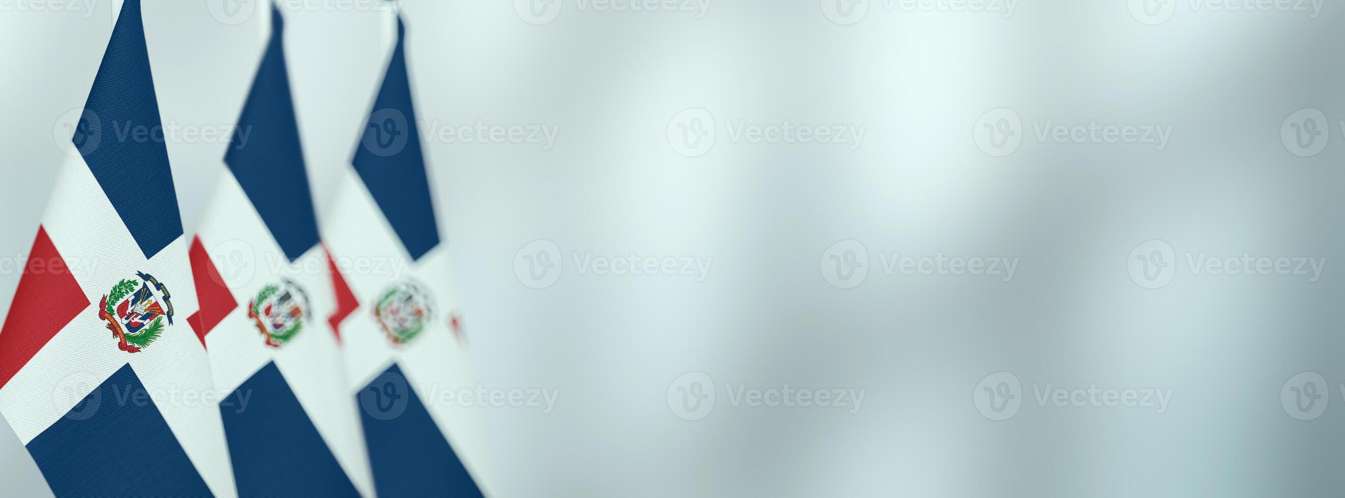 Dominican Republic table flags in the office, banner background with space for text photo