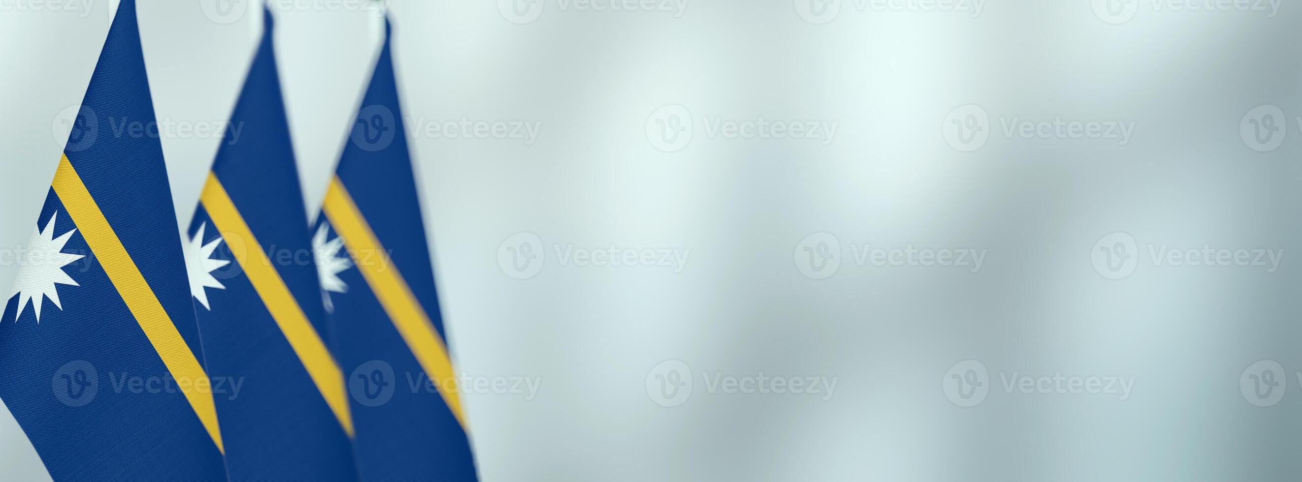 Nauru table flags in the office, banner background with space for text photo