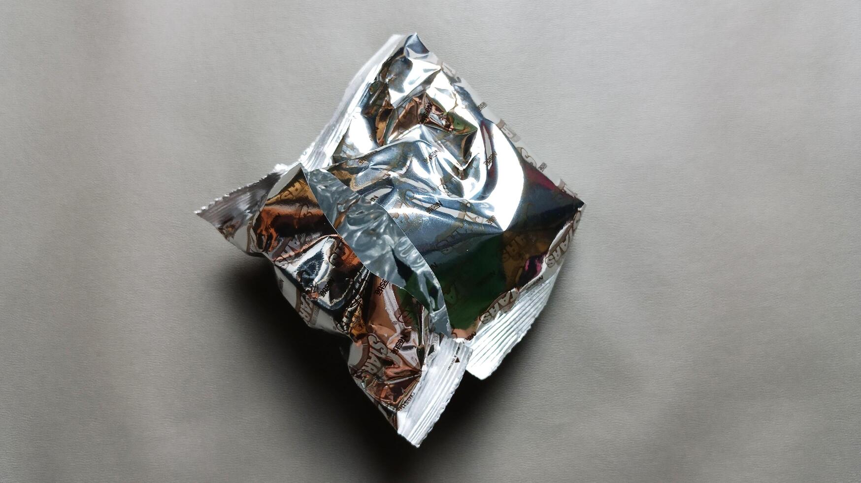 Snack wrappers isolated on a gray background photo
