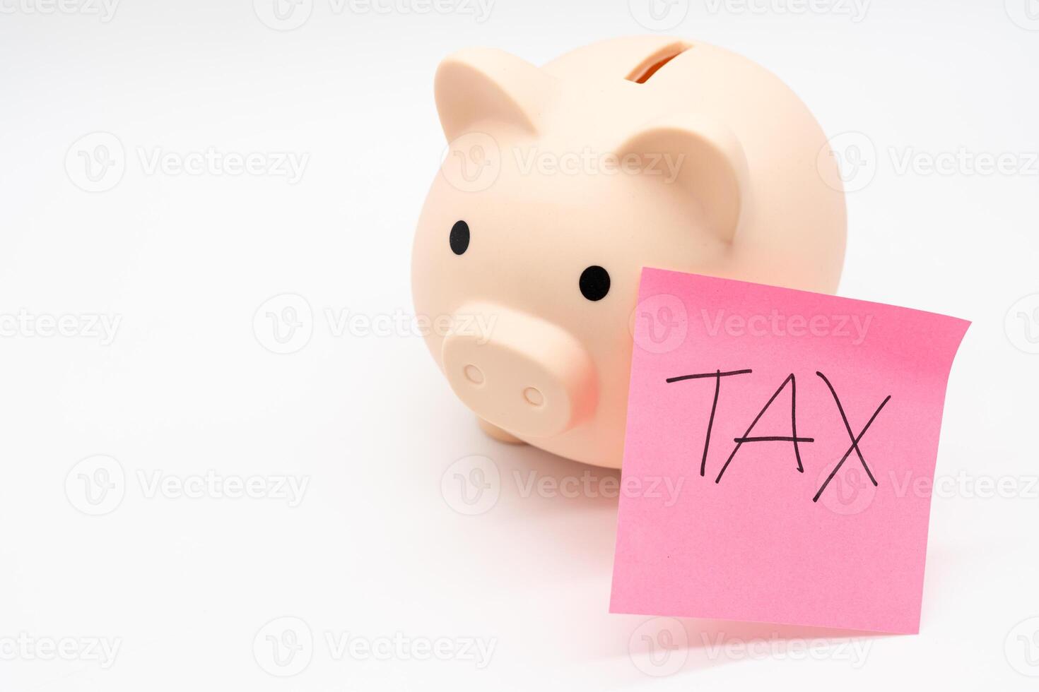 Tax Sticky note with piggy bank, Saving money for tax. Budget, tax, investment, financial, savings photo