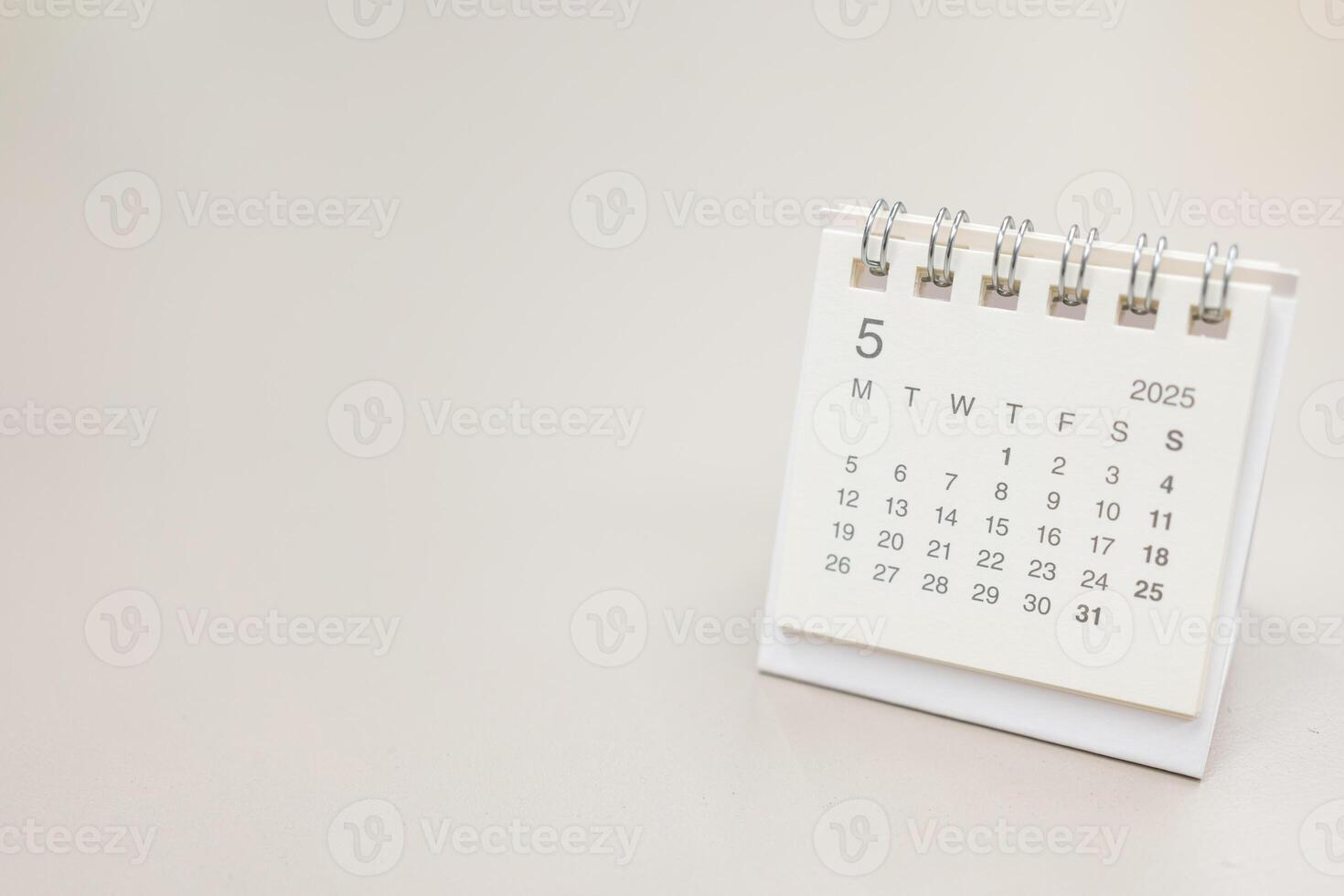 Simple desk calendar for MAY 2025 background. Calendar concept with copy space. 2025 MAY calendar. photo