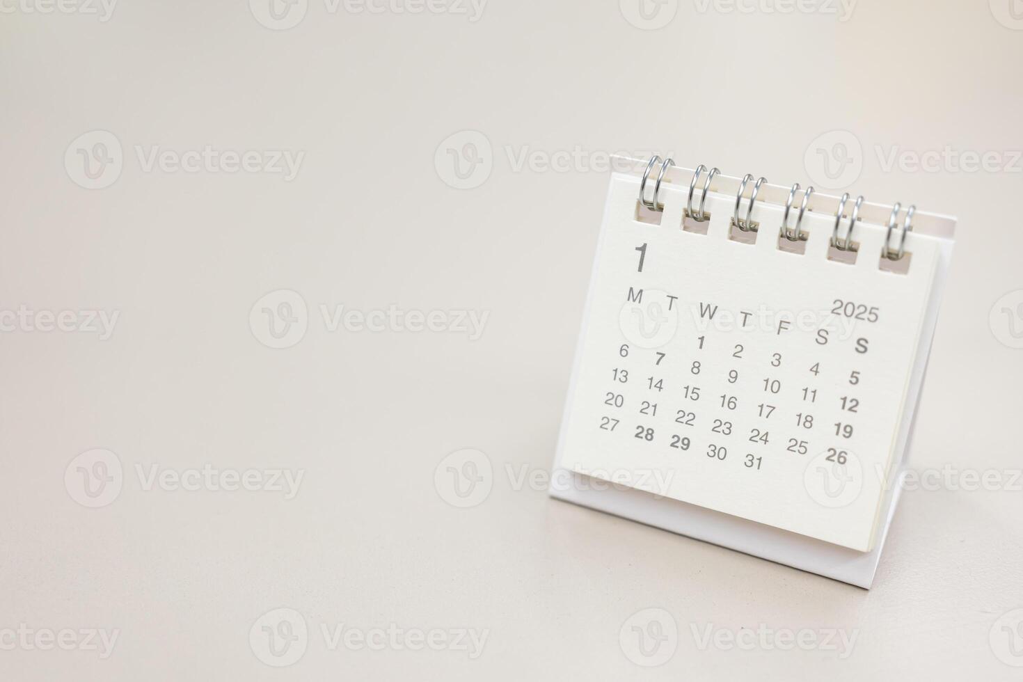Simple desk calendar for JANUARY 2025 background. Calendar concept with copy space. 2025 JAN calendar. photo