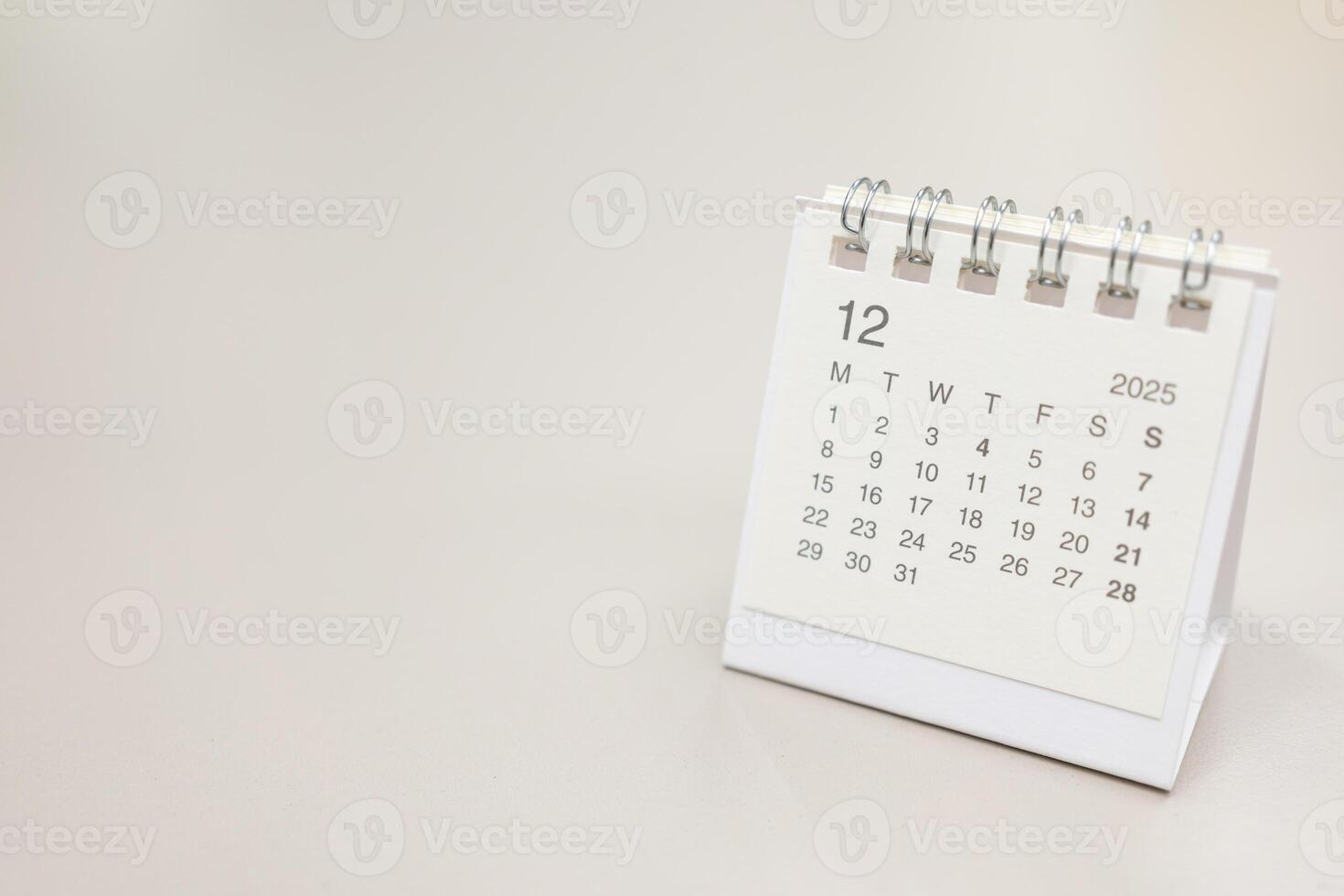 Simple desk calendar for 2025 DECEMBER background. Calendar concept with copy space. 2025 DEC calendar. monthly calendar. photo