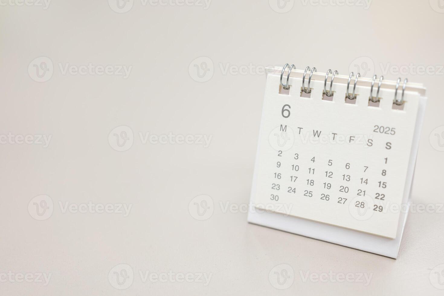 Simple desk calendar for 2025 JUNE background. Calendar concept with copy space. 2025 JUN calendar. monthly calendar. photo
