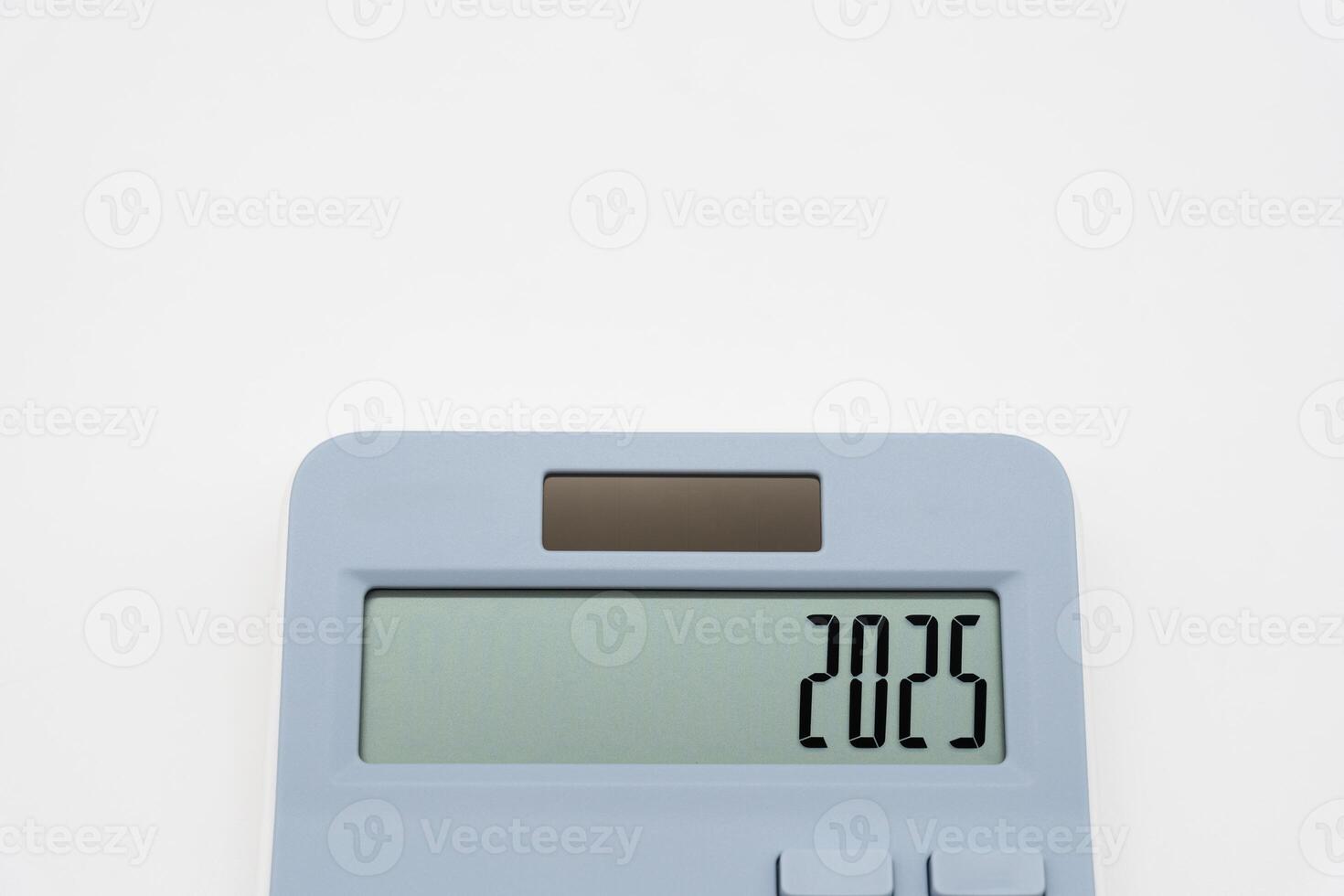 Calculator and forecast for finances in 2025. Money, Budget, tax, investment, financial and savings. calculator with 2025 numbers. photo