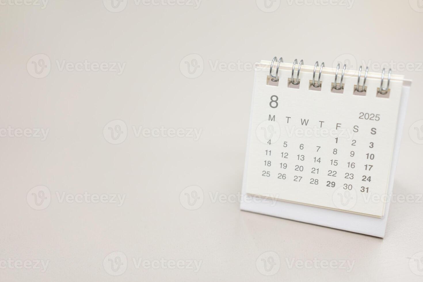 Simple desk calendar for 2025 AUGUST background. Calendar concept with copy space. 2025 AUG calendar. minimal calendar AUG. photo