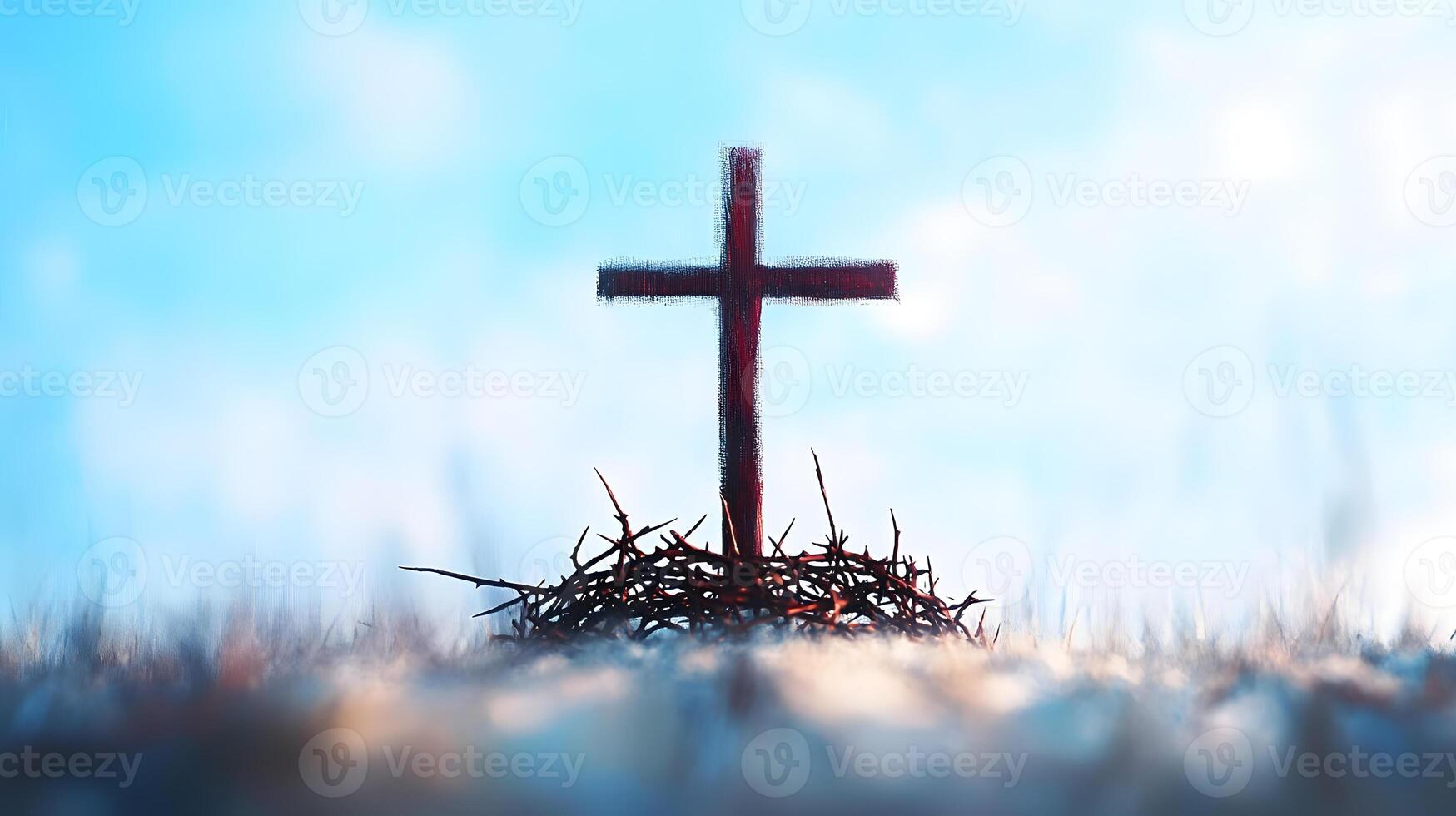 Cross is on a pile of thorns photo