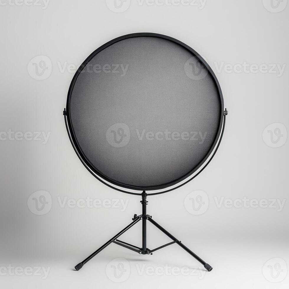 Studio backdrop, circular diffuser, tripod, grey background, photography photo