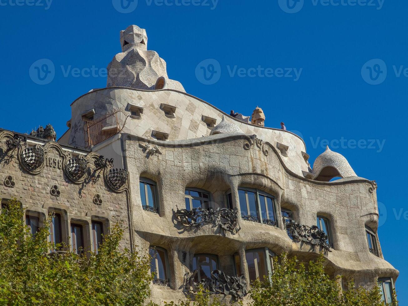 A building with a lot of windows in barcelona photo