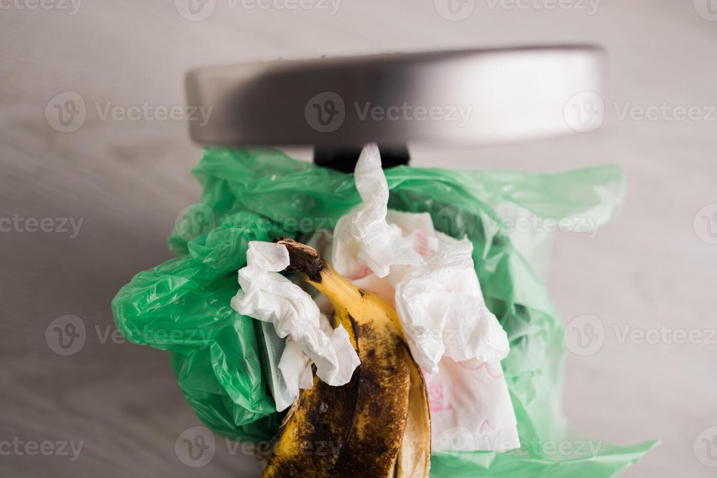 Food waste in Trash Can. Unsorted garbage. Food Waste is an Urgent Global Problem. Food loss is food that is discarded or lost uneaten. photo