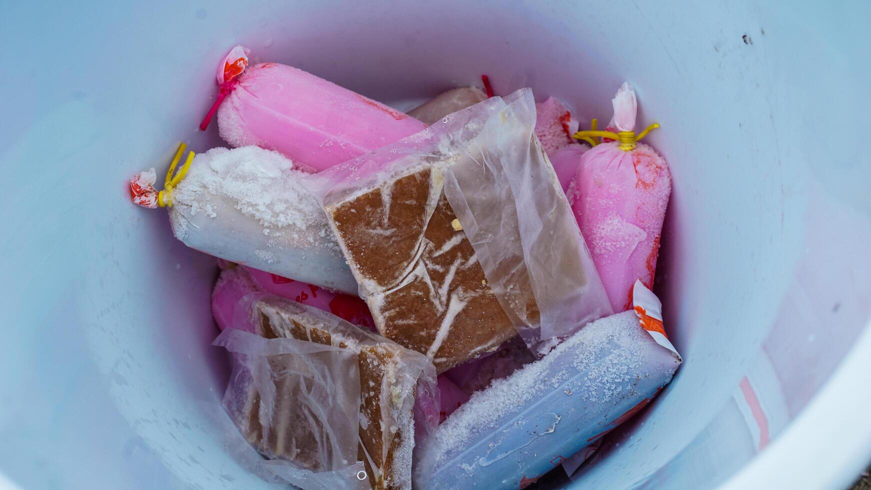 Assorted Frozen Treats in a Bucket photo