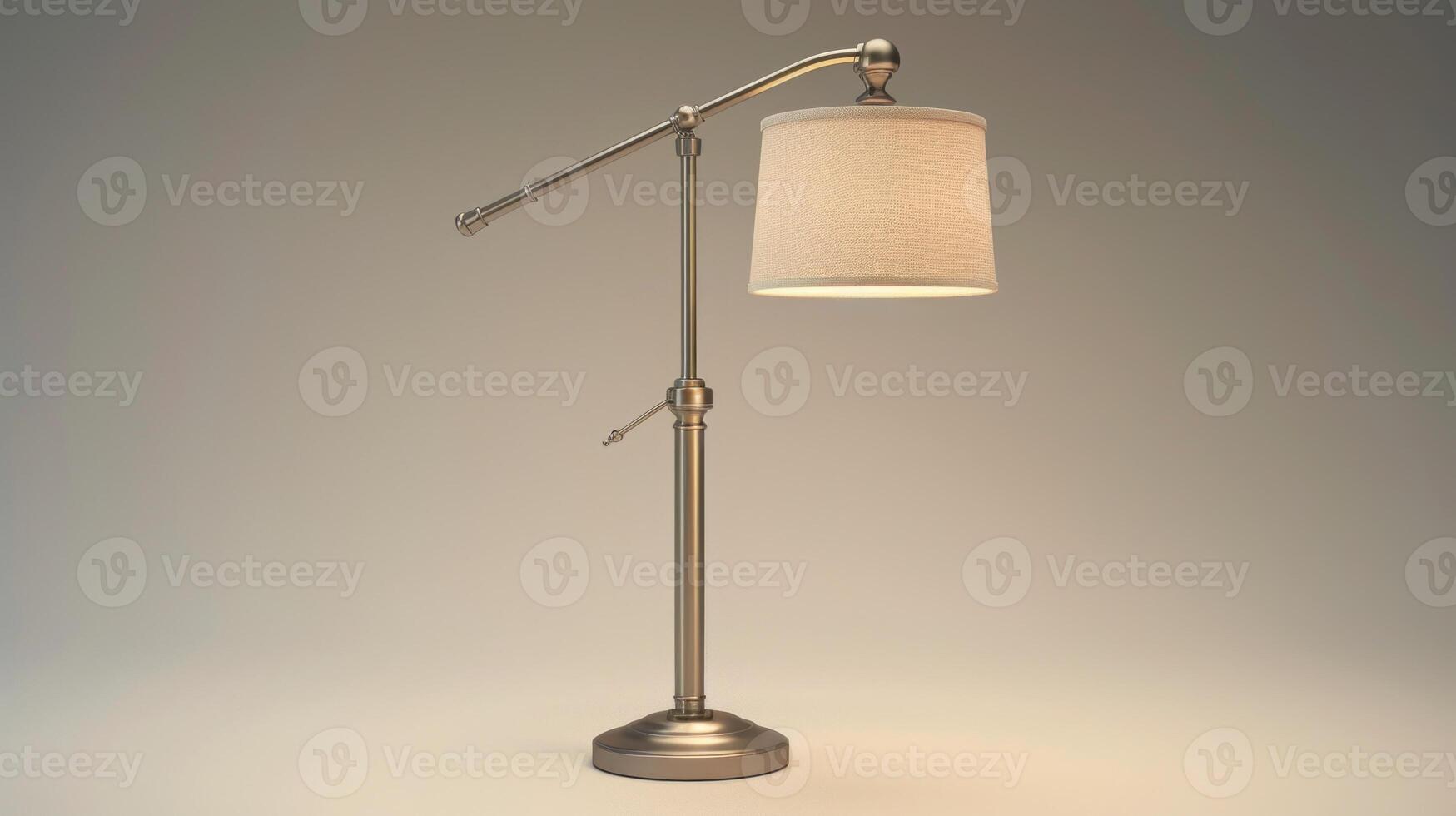 A silver floor lamp with a white shade casts a soft glow in a studio setting photo